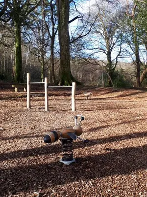 a park with a bird statue on the ground at Blue Skies in St Ives