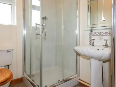 a bathroom with a shower and a sink at Boscastle View in Boscastle