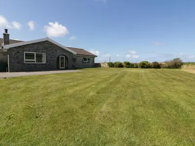a large yard in front of a house at Boscastle View in Boscastle