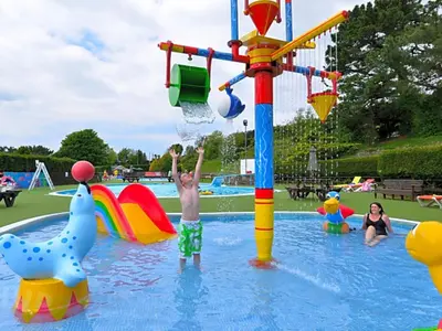 a group of children playing in a water park at Dog Friendly 8 Berth Static Caravan Newquay in Newquay