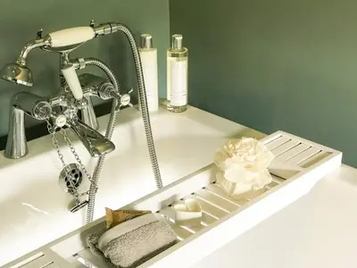 a bathroom sink with a faucet and a sink at The Cornish Peak Beautiful Apartment In Grade 2 Listed Building In Cornwall By STAE-Homes in Camelford