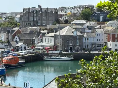a city with boats docked in a harbor with buildings at Idyllic Cottage near Padstow in Little Petherick