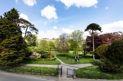 a view of a park with a fence at Park View in Falmouth