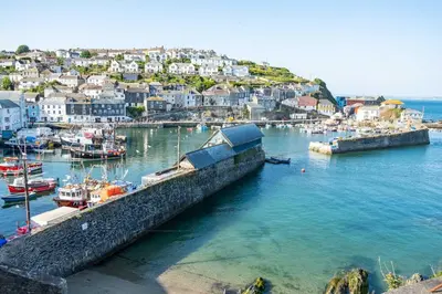an aerial view of a harbor with boats in the water at Shabby Shack near Charlestown & The Eden Project in St Austell