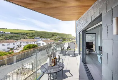 a view from the balcony of a house at The Shore in Mawgan Porth