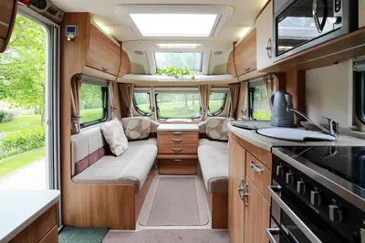 an interior view of a camper van with a kitchen at Pinetum Gardens Retreats in St Austell