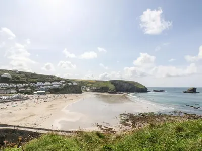 a view of a beach with people on it at Summerhayes in Redruth