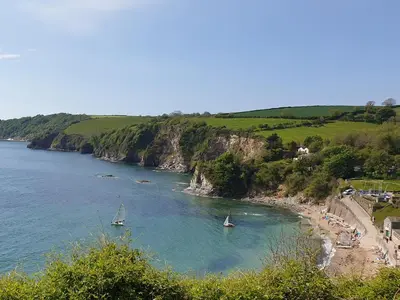 a view of a beach with boats in the water at Robin Hill in St Austell