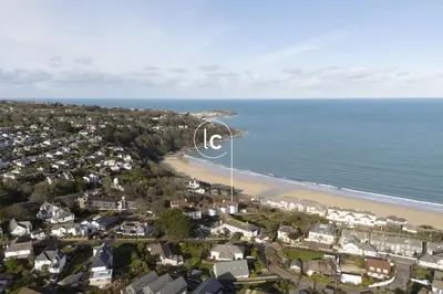 an aerial view of a beach with a street light at Fairsky - Sea Views and Allocated Parking in Carbis Bay