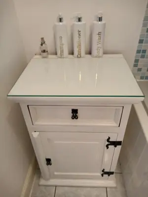 a white bathroom sink with two toilets on it at West Looe Downs in Looe