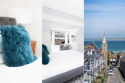 a hotel room with a blue stuffed animal on a bed at St Hilary in St Ives