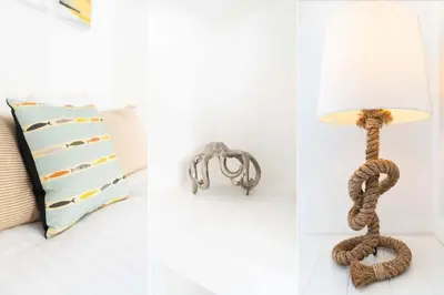 a table lamp with a rope on it next to a bed at St Ives House in St Ives