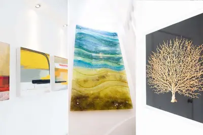 three pictures of art on display in a gallery at St Ives House in St Ives
