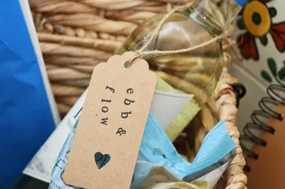 a tag on a basket with a glass jar at Holiday home with Estuary Views, parking & balcony in Padstow