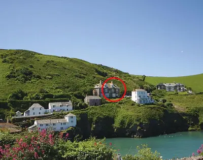 a house on top of a hill with a red circle at Folly 2 in Port Isaac