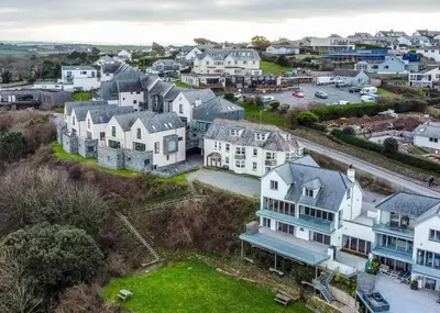 an aerial view of a residential neighborhood with houses at Pinewood Flat 5 in Polzeath