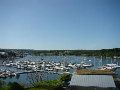 a marina filled with lots of boats in the water at Topsail - Falmouth in Falmouth