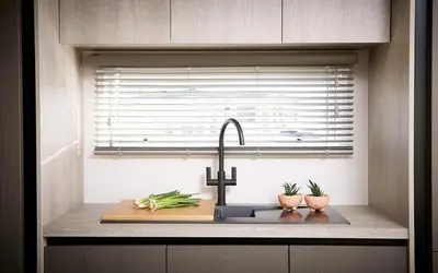 a kitchen counter with a sink and a window at 1.2 padstow in Padstow