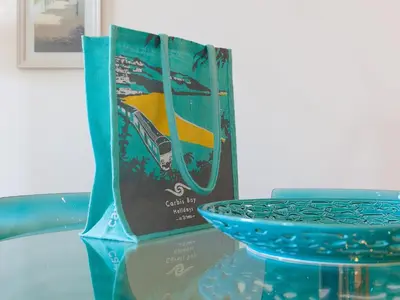 a blue bowl sitting on top of a table at Crystal Bay in St Ives