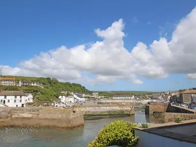 a view of a river with a town in the background at The Dairy in Helston