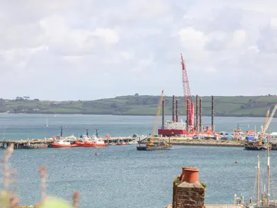 a group of boats are docked in a harbor at The Wesley Apartment in Falmouth