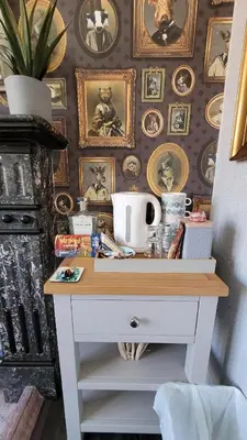 a white desk with a wooden top in front of a wall at Lansdowne Simply Stay in Redruth
