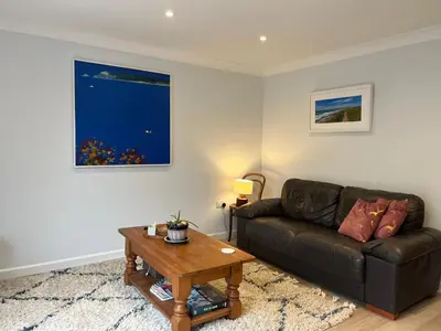 a living room with a couch and a coffee table at The Hannexe in Wadebridge
