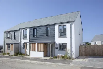 an image of a house with a black roof at Wish You Were Here - Hot Tub - Free Parking & Free WiFi in Newquay