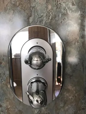a reflection of a toaster in a mirror at The Barn at Well Cottage in Bude