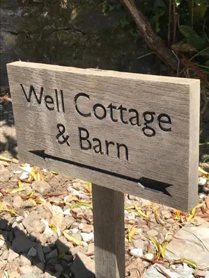 a sign that says wall coffee and barn at The Barn at Well Cottage in Bude