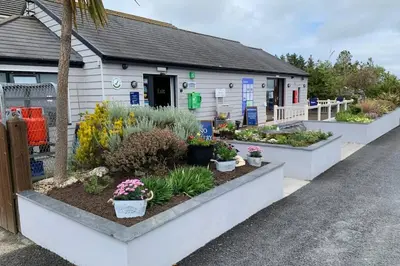 a small building with plants in front of it at Lowena Lodge - Padstow in Padstow