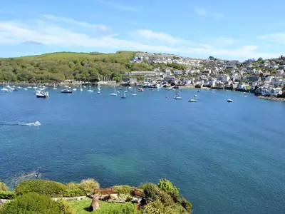 a view of a large body of water with boats at Apartment 2 The Wheelhouse in Fowey