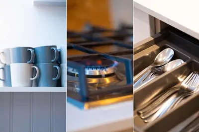a stove with cups and utensils in a kitchen at 23 Trenwith Place in St Ives