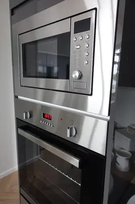 a microwave oven sitting inside of a kitchen at Padstow Lodge - Padstow Holiday Village in Padstow