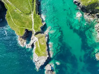an aerial view of the ocean and a beach at Seahaven in Port Isaac