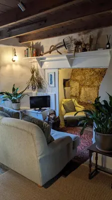 a living room with two couches and a couch at The Hideaway in Falmouth