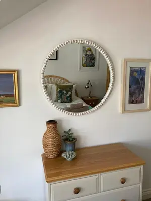 a mirror on top of a dresser in a room at Ocean Breeze No 5, Seaview & Parking in Falmouth
