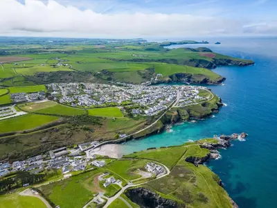 an aerial view of a town next to the ocean at Campion Lodge in Port Isaac