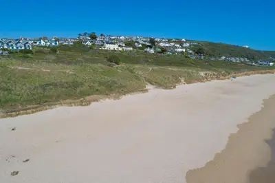 an aerial view of a beach with houses at Ocean View, The Sands in Praa Sands