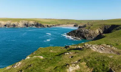 a view of the ocean and a beach at Camping Pods Trevella Holiday Park in Crantock