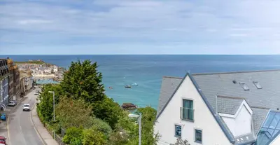 a view of the ocean from a building at Porthminster Mews in St Ives