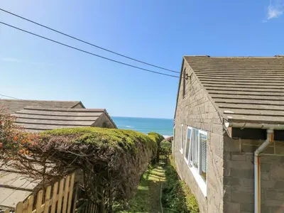 a house with a view of the ocean at Stonecroft in Praa Sands