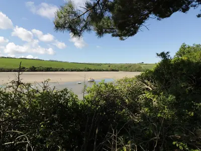 a view of a river with boats in the water at Gannel Hideaway in Newquay