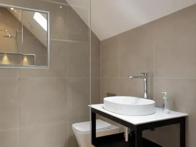 a bathroom with a sink and a toilet at Porthilly Greys in Padstow