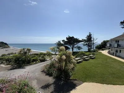a view of the beach from a house at View of the Sea - Mount Brioni in Downderry