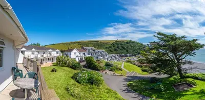 a view from the balcony of a house at Ocean Waves - Mount Brioni in Downderry