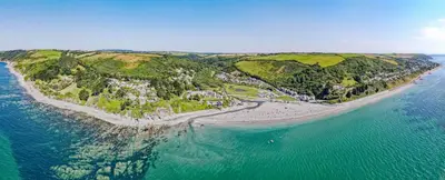 an aerial view of an island in the ocean at The Lookout - Mount Brioni in Downderry