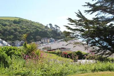 a view of a town with a hill at Sand Bar - Mount Brioni in Downderry