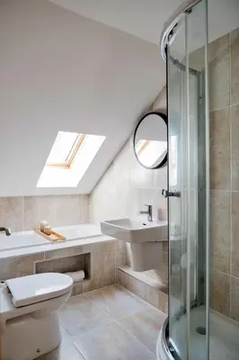 a bathroom with a toilet and a sink and a shower at Finest Retreats - Tolcarne Stay - Luxury Newquay Apartment in Newquay