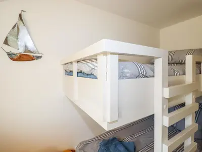 a white bunk bed in a room at Jonwyns in Tintagel